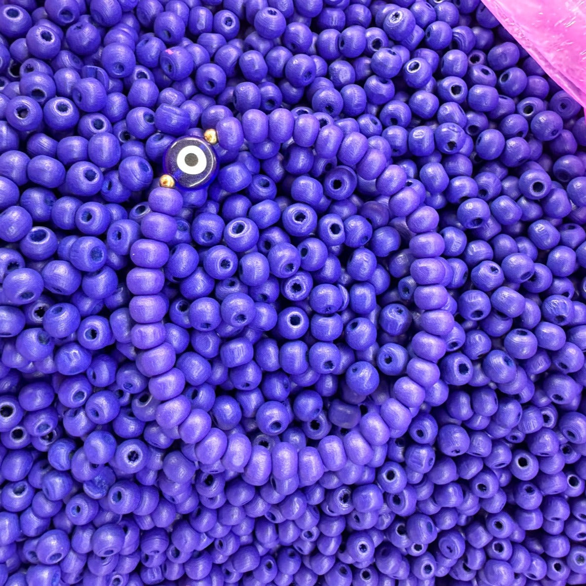 Purple evil eye wooden bead bracelet