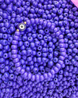 Purple evil eye wooden bead bracelet