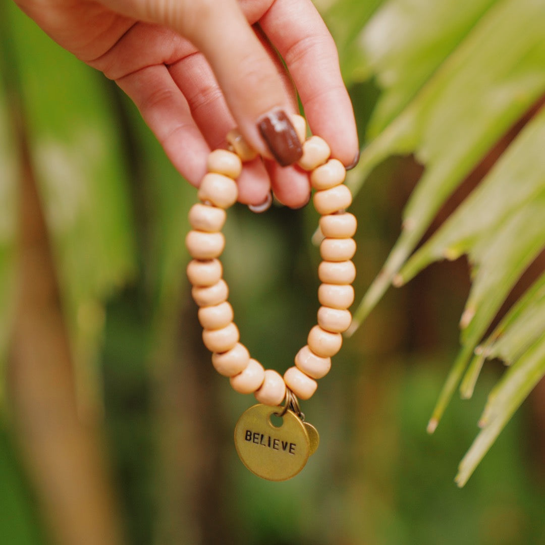 Peach beaded charm bracelet