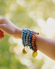 Beaded charm bracelet stack