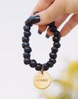 black beaded charm bracelet