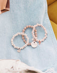 white beaded charm bracelet