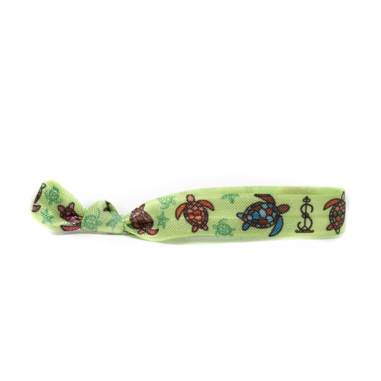 Eco-friendly Simbi hair tie with turtle print. Perfect for nature lovers.