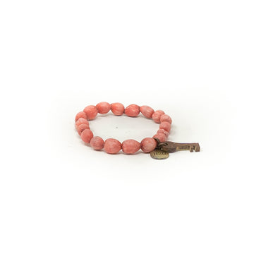 Hand-carved key charm red beaded bracelet