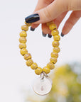 Handmade yellow beaded bracelet bracelet with pineapple charm