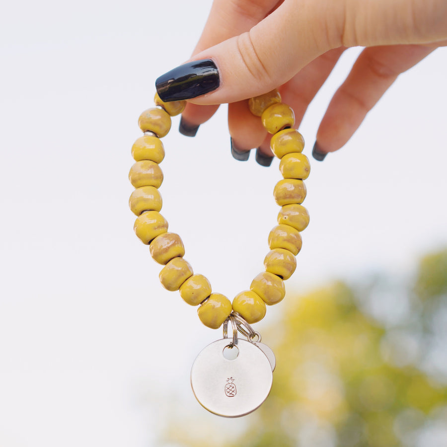 Handmade yellow beaded bracelet bracelet with pineapple charm